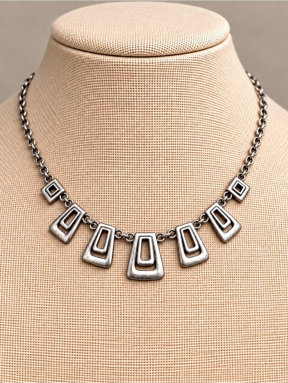 Title: Silver Tone Geometric Statement Necklace – Modern Layered Design
